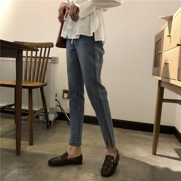 Blugi de damă eleganti în albastru cu fante