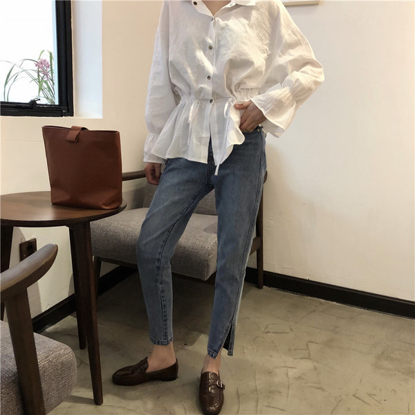 Blugi de damă eleganti în albastru cu fante