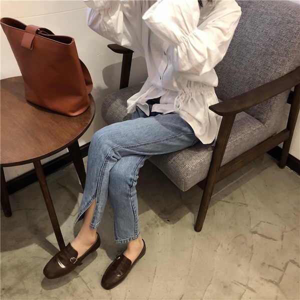 Blugi de damă eleganti în albastru cu fante