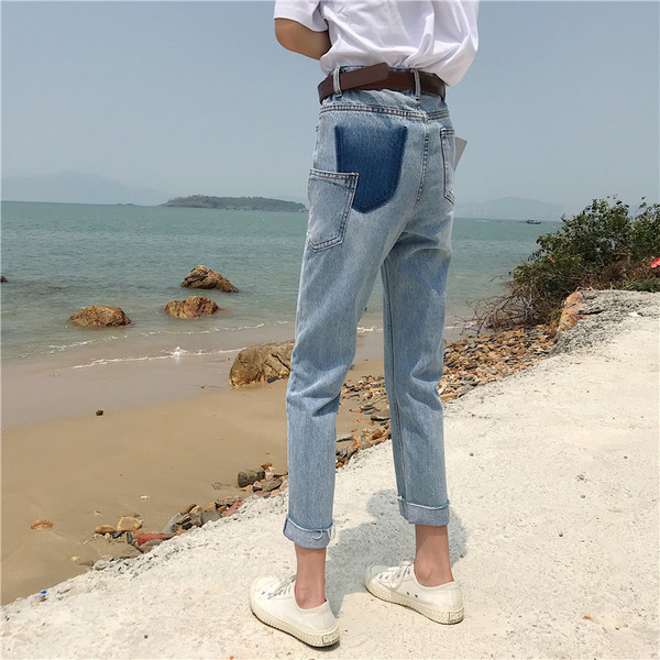 Blugi de damă moderni cu talie înaltă - un model larg