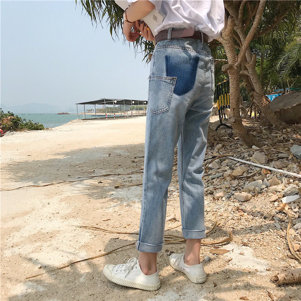 Blugi de damă moderni cu talie înaltă - un model larg