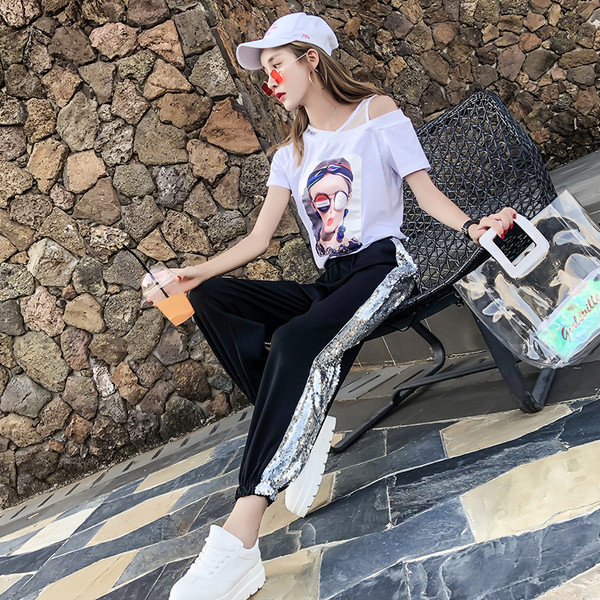 Pantaloni de dama moderni in doua culori cu un element de paiete