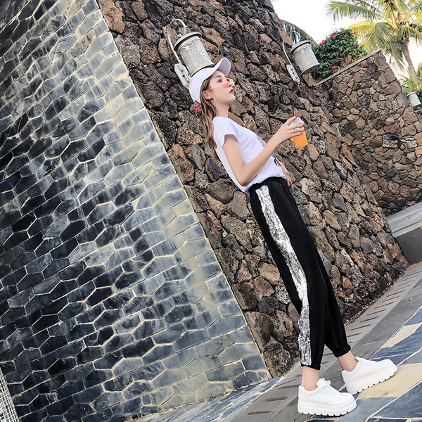 Pantaloni de dama moderni in doua culori cu un element de paiete