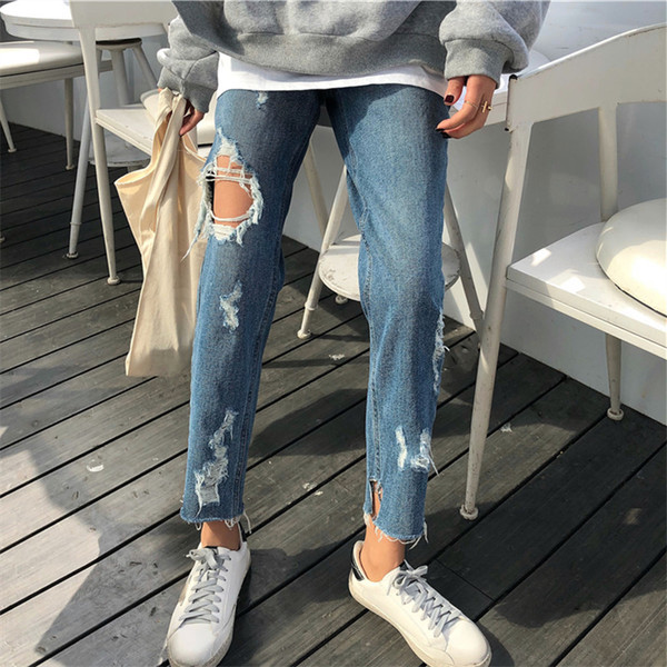 Blugi de dama cu motive rupte si talie standard