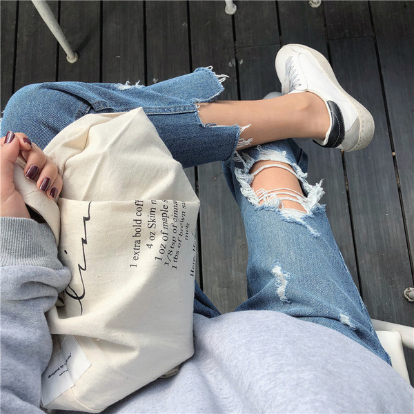 Blugi de dama cu motive rupte si talie standard