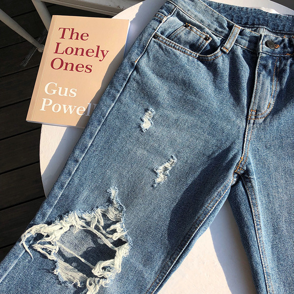 Blugi de dama cu motive rupte si talie standard