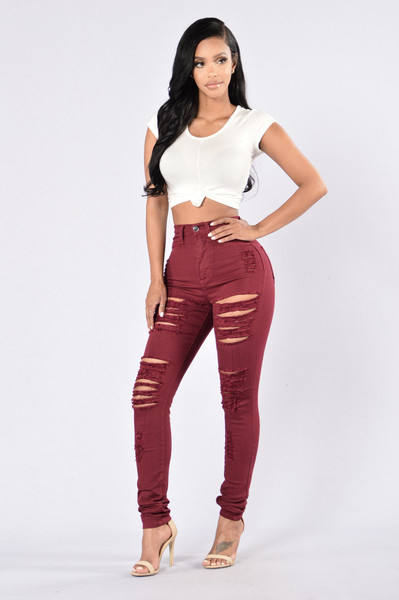 Blugi de dama de culoare rosu inchis cu talie inalta si motive rupte
