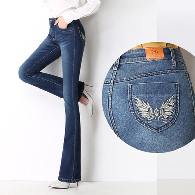 Stylish women`s jeans in two colors with embroidery - wide model