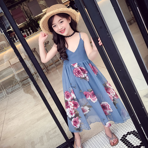 Rochie moderna pentru copii cu bretele subtiri si motive florale in doua culori