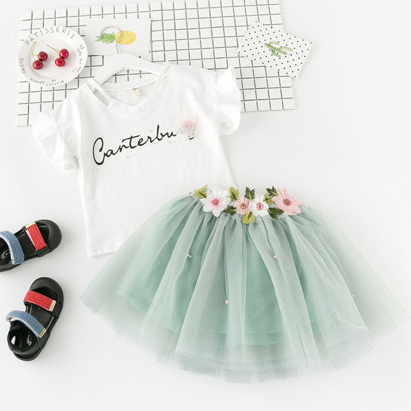 Set copii pentru fete care include o fustă din tul și o bluză cu mâneci scurte