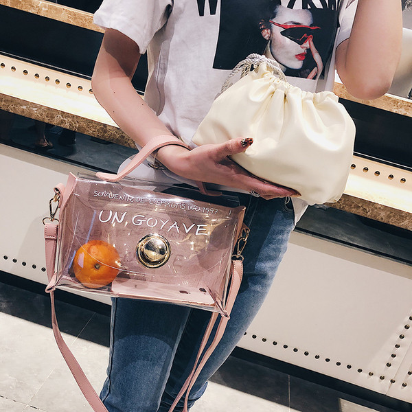 Geanta dama cu motive transparente si inscriptii in mai multe culori