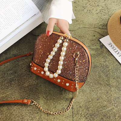 Σύγχρονη γυναικεία τσάντα με μπροκάρ και πέρλες σε τέσσερα χρώματα