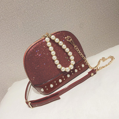 Σύγχρονη γυναικεία τσάντα με μπροκάρ και πέρλες σε τέσσερα χρώματα