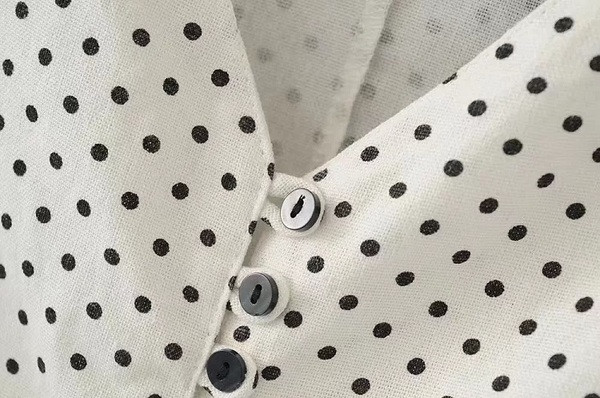 Κομψή γυναικεία μπλούζα με φαρδιά μανίκια και κουμπιά