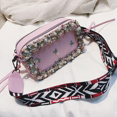 Γυναικεία τσάντα  με μακριά χρωματιστή λαβή και 3D floral διακόσμηση