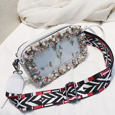 Γυναικεία τσάντα  με μακριά χρωματιστή λαβή και 3D floral διακόσμηση