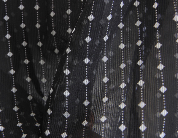 Bluză de damă cu mâneci largi și cravate