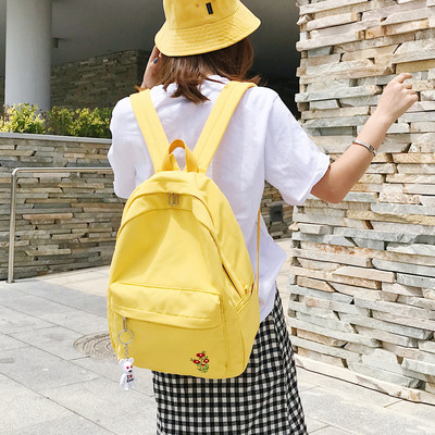 Γυναικείο σακίδιο με μικρό φυτικό κέντημα σε διάφορα χρώματα