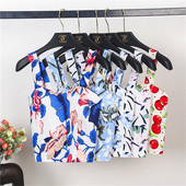 Къс дамски топ в различни флорални мотиви 