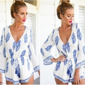 Γυναικεί αολόσωμη φόρμα με κοντό μανίκι και V-λαιμός