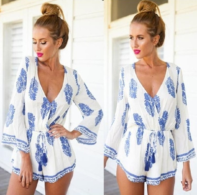 Γυναικεί αολόσωμη φόρμα με κοντό μανίκι και V-λαιμός