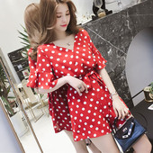 Γυναικεία ολόσωμη φόρμ με ντεκολτέ και ζώνη κατάλληλη για τη καθημερινή ζωή