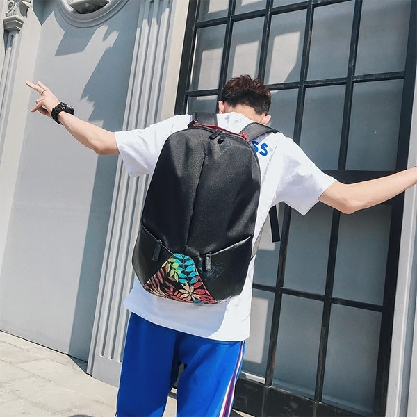 Μεγάλο ανδρικό σακίδιο  σε μαύρο χρώμα με φυτική διακόσμηση