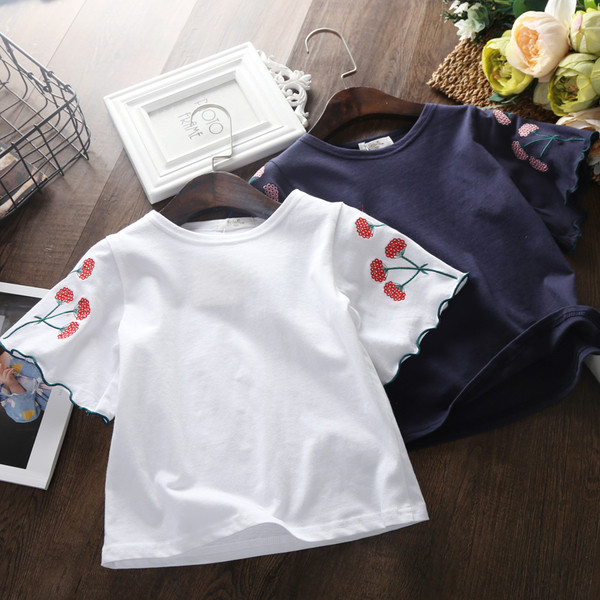 Gyermek blúz lányoknak fehér és kék virágos hímzéssel