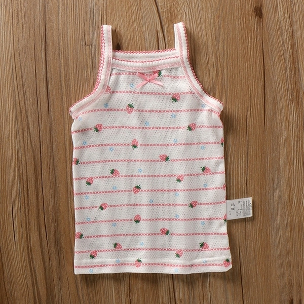 Gyerek szett három felsőrészből, fehér ruhában, díszítéssel