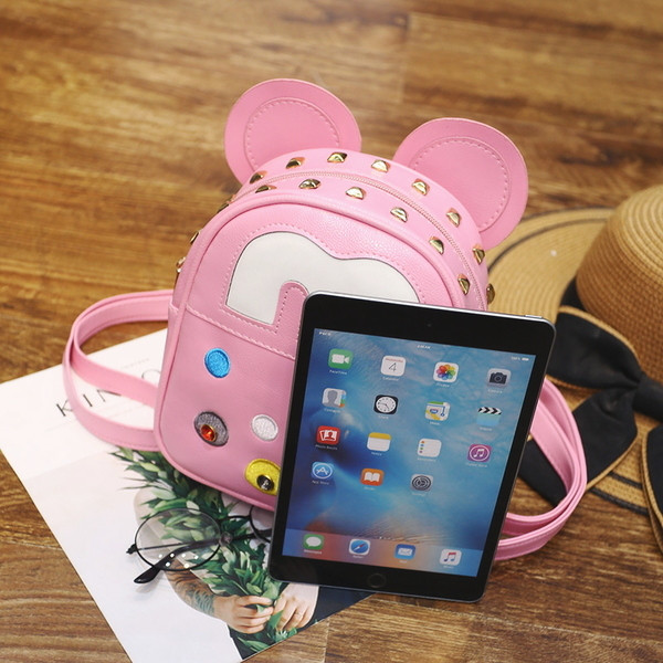 Παιδικό σακίδιο με διακοσμητικά μεταλλικά στοιχεία για κορίτσια σε 2 μοντέλα