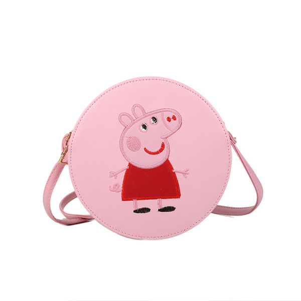 Μία μικρή τσάντα με εκτύπωση και μακριές λαβές κατάλληλη για κορίτσια