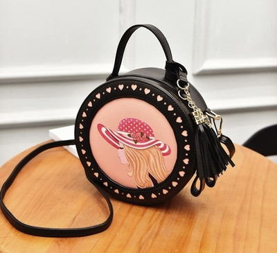 Μικρή παιδική στρογγυλή τσάντα για κορίτσια