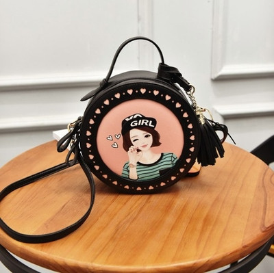 Μικρή παιδική στρογγυλή τσάντα για κορίτσια