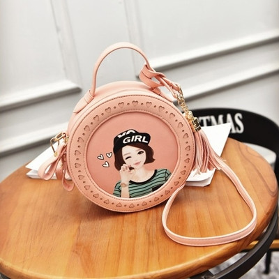 Μικρή παιδική στρογγυλή τσάντα για κορίτσια