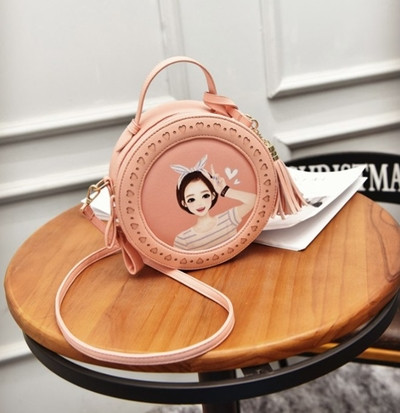 Μικρή παιδική στρογγυλή τσάντα για κορίτσια