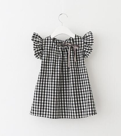 Bluză pentru copii în carouri pentru o fată cu panglică