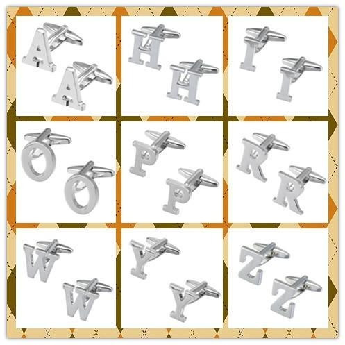 Butoni de argint cu simboluri latine