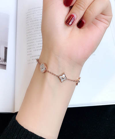 Women`s bracelet with different elements