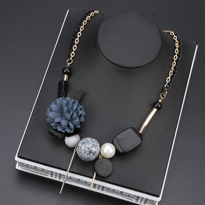 Stylish women`s necklace with interesting decorations
