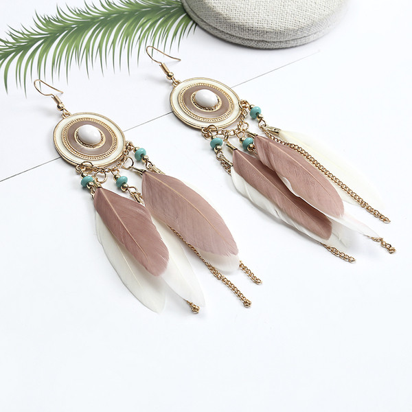 Κομψά γυναικεία σκουλαρίκια  με φτερά