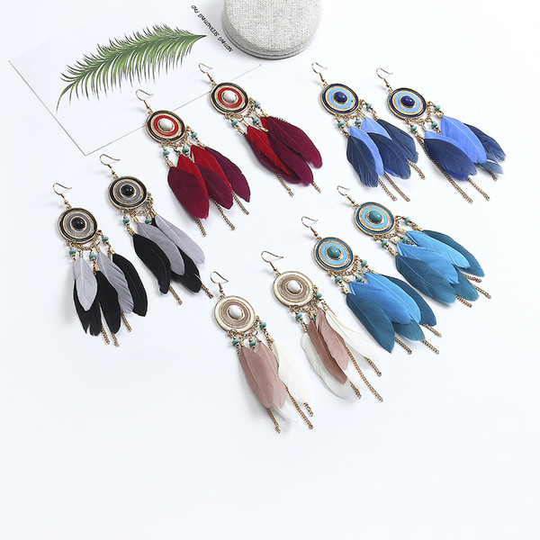 Κομψά γυναικεία σκουλαρίκια  με φτερά