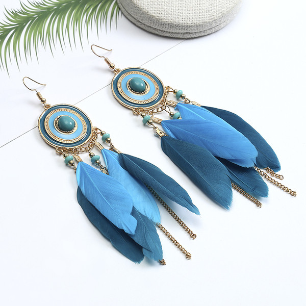 Κομψά γυναικεία σκουλαρίκια  με φτερά