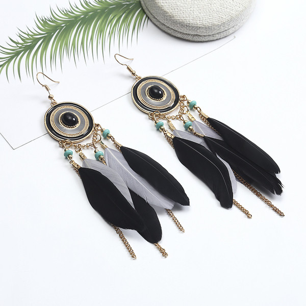 Κομψά γυναικεία σκουλαρίκια  με φτερά