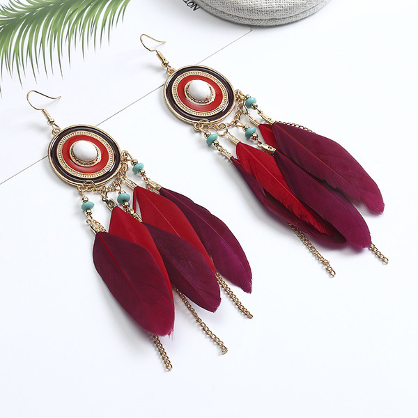 Κομψά γυναικεία σκουλαρίκια  με φτερά