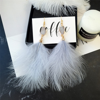 Cercei de dama cu pene care cad