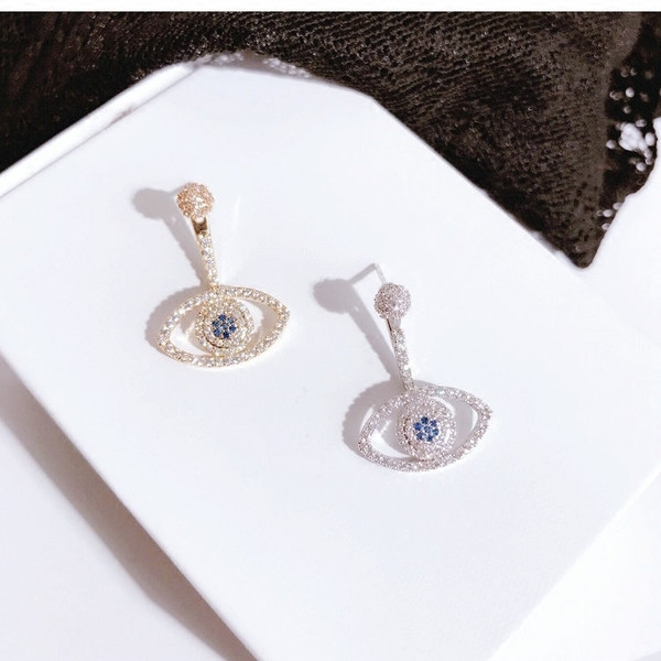 Cercei moderni de dama in forma de ochi cu pietre decorative