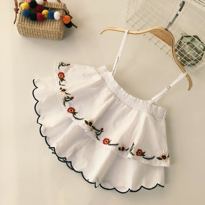 Top de dama modern cu motive florale in doua culori