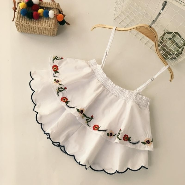 Top de dama modern cu motive florale in doua culori