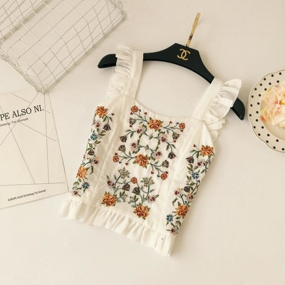 Γυναικείο trendy top με φαρδιές λουριά ώμου και floral κεντήματα σε λευκό και μαύρο χρώμα