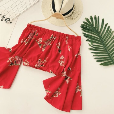 Κομψή γυναικεία μπλούζα με φαρδιά μανίκια και φυτικά μοτίβα